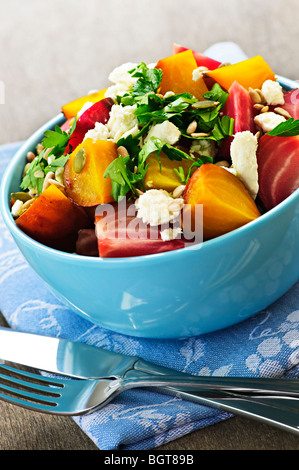 Bowl of roasted sliced red and golden beets Stock Photo