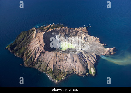 Steaming Crater Lake and Outflow, White Island, Active Volcano, Bay of Plenty, North Island, New Zealand - aerial Stock Photo