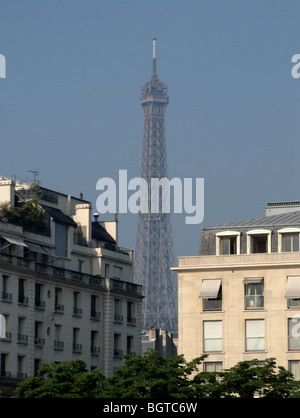 Tour Eiffel seen through buildings at VII arrodisement (7th municipal borough). Paris. France Stock Photo