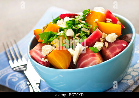 Bowl of roasted sliced red and golden beets Stock Photo