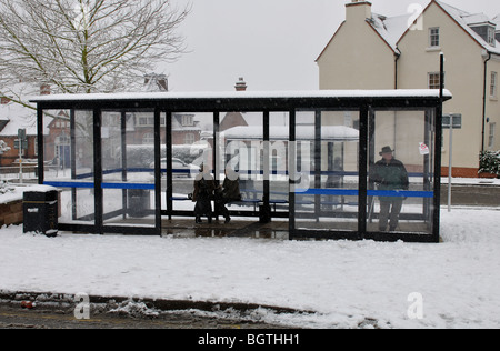 Bus shelters in snow, Warwick town centre, Warwickshire, UK Stock Photo
