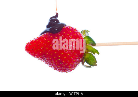 Strawberry dipped in chocolate. Isolated on white Stock Photo