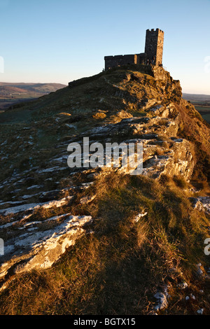 Brent Tor Church lit by the last rays of winter sunshine, Dartmoor, Devon. Stock Photo