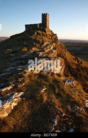 Brent Tor Church lit by the last rays of winter sunshine, Dartmoor, Devon. Stock Photo