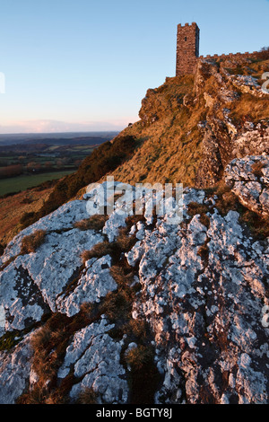 Brent Tor Church lit by the last rays of winter sunshine, Dartmoor, Devon. Stock Photo