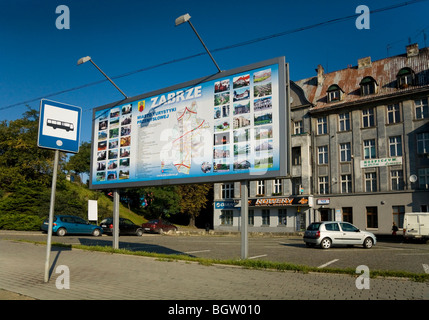 Tourist information sign / map at bus stop on a road / high street in the Polish town of Zabrze. Silesia. Poland. Stock Photo