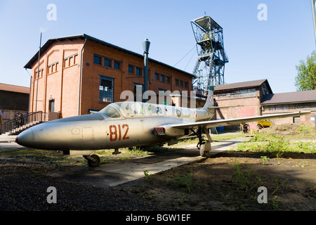 Display / exhibit of a Polish air force jet aircraft on show to tourists at Louisa coal mine museum. Zabrze, Silesia. Poland. Stock Photo