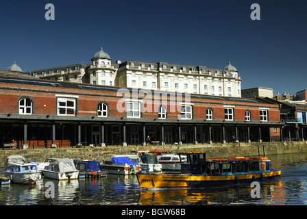 A view of Bristol docks in the very centre of Bristol with the Swallow Royal Hotel in the background on  very bright sunny day. Stock Photo