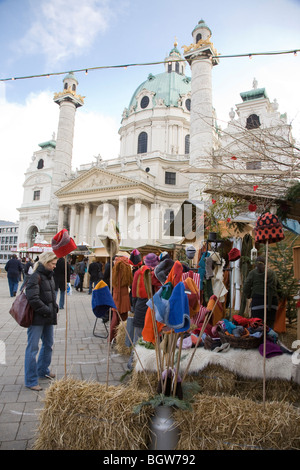 A Christmas market in front of the Saint Charles Borromeo Church (Karlskirsche) in Vienna, Austria Stock Photo