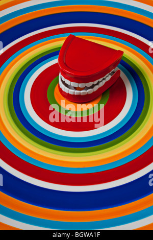 Chattering teeth on circle plate Stock Photo