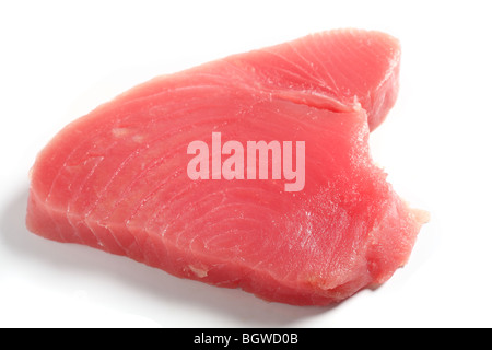 Bluefin tuna (blue ahi tuna) steak, over white. This is regarded as the finest tuna and is the kind used in sushi. Stock Photo