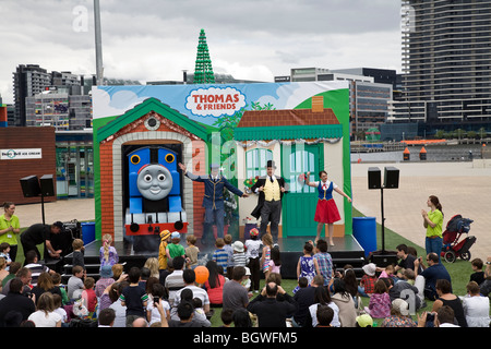 Children watching Thomas the Tank Engine at Melbourne Docklands, Australia Stock Photo