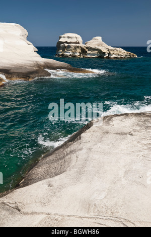 Greece, Island of Milos: the white, volcanic cliffs, rock formations ...