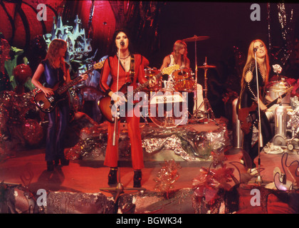 RUNAWAYS - US girl group in 1977 with from left: Vicki Blue, Joan Jett, Sandy West on drums and Lita Ford on lead guitar Stock Photo
