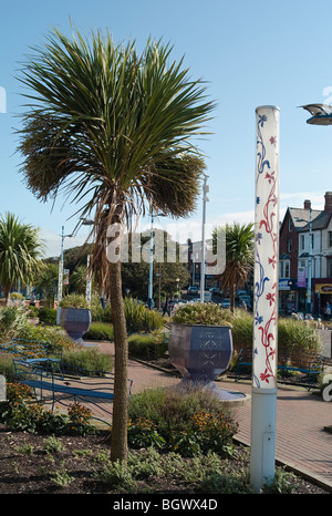 Palm trees and futuristic lamps in the centre of Lytham St Annes Lancashire UK Stock Photo