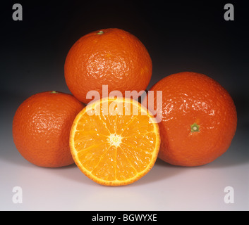 Group of mandarin fruit, whole & sectioned, variety Or or Orah Stock Photo