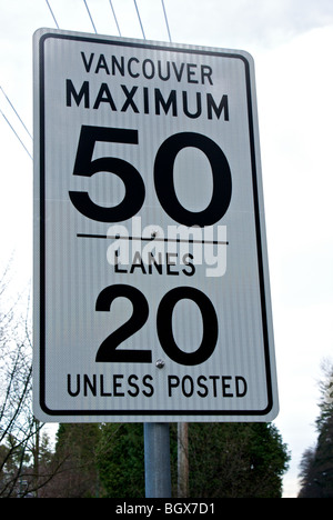 50 kph and 20 kph reflective plastic traffic speed limit signs in Vancouver city Stock Photo