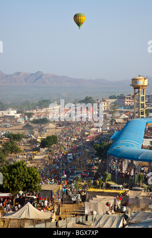 Hot air balloon over the Fairgrounds during the Camel Mela in Pushkar India Stock Photo