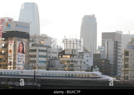 Shinkansen (Bullet train) traveling through the Shiodome district, Tokyo, Japan, on Monday, Feb. 19, 2007. Stock Photo