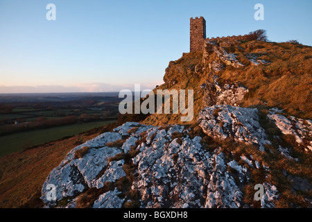 Brent Tor Church lit by the last rays of winter sunshine, Dartmoor, Devon. Stock Photo