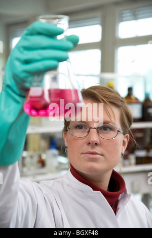 Apprentice laboratory assistant working at Evonik AG, Marl, Germany Stock Photo