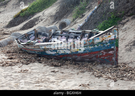 Abandoned boat on the beach in Maputo, Mozambique, East Africa Stock Photo