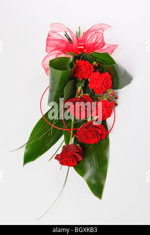 Red roses, Valentines day gift box and heart shaped ribbon over wooden ...