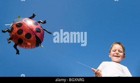 Little boy and balloon Stock Photo