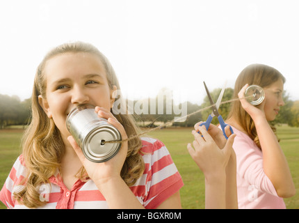 Kids with Tin Can Phones Stock Photo