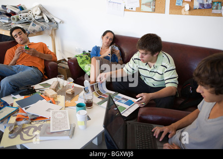 College students hanging out in lounge Stock Photo