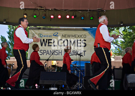 Members of La Sociedad Colonial Espanola de Santa Fe perform on the Plaza Stage during Spanish Market Stock Photo