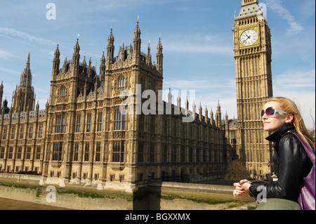 Woman next to big ben Stock Photo