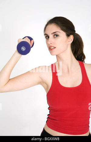Young Caucasian woman working out Stock Photo