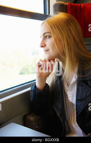 Woman in the train Stock Photo