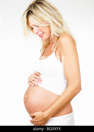 Pregnant woman smiling Stock Photo