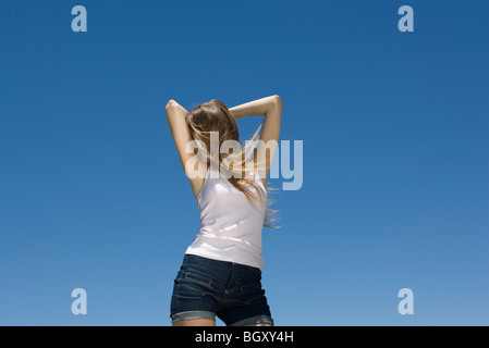 Young woman dancing outdoors Stock Photo
