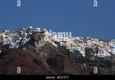 view of santorini ,Greece island from the sea boat the cliffs and the village of oia Stock Photo