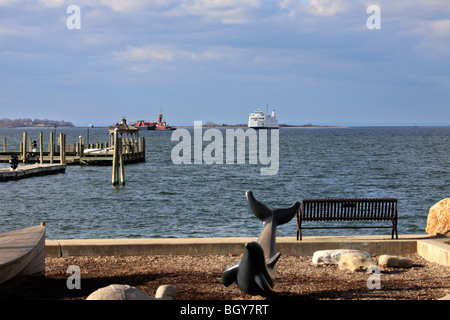 Car and passenger ferry approaches Port Jefferson, Long Island, NY after crossing Long Island Sound from Bridgeport, CT Stock Photo