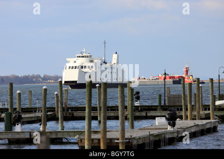 Car and passenger ferry approaches Port Jefferson Harbor after crossing Long Island Sound from Bridgeport Stock Photo