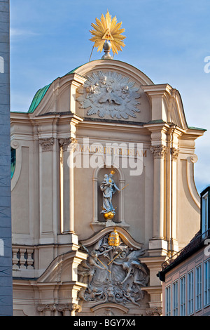 Facade of the Heilig-Geist-Kirche (Church of the Holy Spirit) in the City of München (Munich), Bavaria, Germany, Europe. Stock Photo