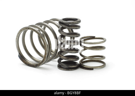 Three metal spring coils isolated on white background Stock Photo - Alamy