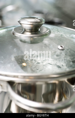 Water boiling in pot Stock Photo