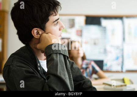 High school student daydreaming in class Stock Photo