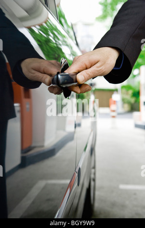 Opening car door Stock Photo