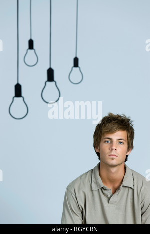 Young man looking at camera, portrait Stock Photo