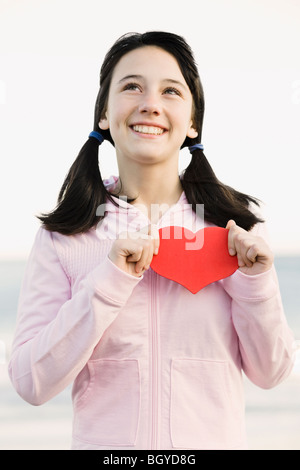 Young girl holding heart Stock Photo