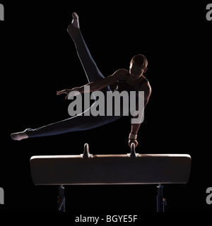 Male gymnast on pommel horse Stock Photo