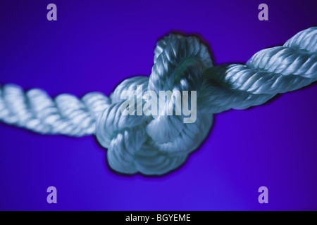 Rope tied in knot Stock Photo