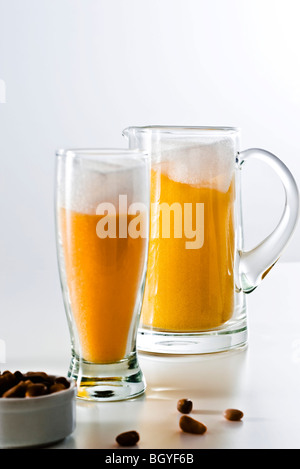 Food concept, fake mug and pitcher of beer Stock Photo