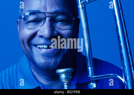 Man with trombone Stock Photo